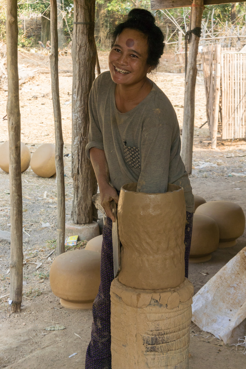 Woman making pots